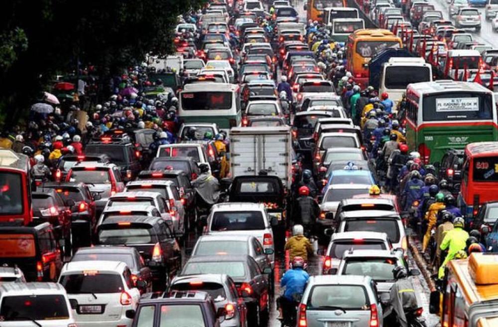 Mengurai Kemacetan dengan Tata Aturan Transportasi dan Parkir Terintegrasi Mengurai Kemacetan dengan Tata Aturan Transportasi dan Parkir Terintegrasi